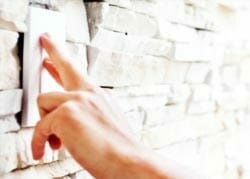 Fingers on doorbell